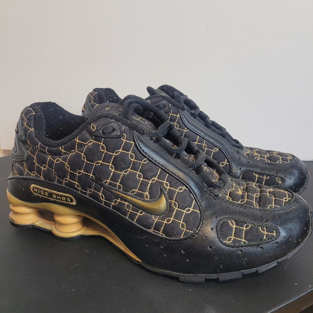 Nike Shox Black and Gold Sneakers